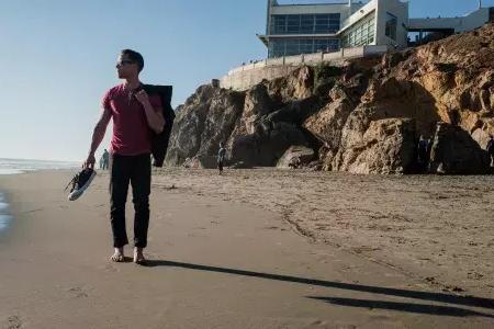 Nick Whittlesey barefoot on Ocean Beach